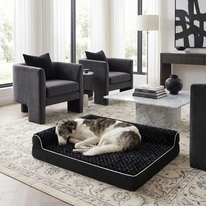 Lit-pour-grand-chien-orthopédique-xxl avec traversin intégré,antidérapant-imperméable-déhoussable-lavable en machine-résistant aux griffes et morsures  pour grand chien et chiot jusqu'à 50 kg max-en velours côtelé et 100% Coton PP et deux traversins cylindriques rembourré en forme de L de couleur gris pour un effet apaisant et sécurisant-un chien qui dort couché en boule contre le traversin en L ultra-doux et hypoallergénique de couleur noir épais et ergonomique dans le salon de la maison