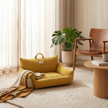 Canape-lit-chien-apaisant, mini fauteuil en lin et rembourrage épais 100% coton haute densité, avec accoudoir et dossier ergonomique, lavable en machine, antidérapant et fond imperméable anti-moissisure, housse 100% lin résistant aux griffes et respirant pour un couchage 4 saisons pour chiot et chien de petite taille de 0 à 10 kilos max-gros plan sur  le petit canapé moelleux de couleur ocre avec dossier et accoudoirs rembourrés 100% coton avec design original
